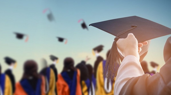 A Graduate Getting Ready To Throwing Away The Degree Cap.