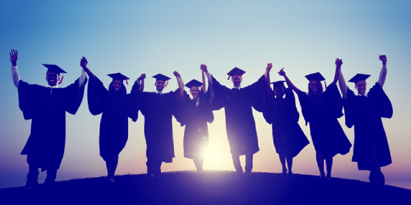 A Group Of Graduates Raising Hands In The Resemblence Of Their Graduation Success.