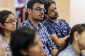 Group Of IIM And IIT Students Listening A Lecture In Classroom.