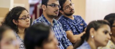 Group Of IIM And IIT Students Listening A Lecture In Classroom.