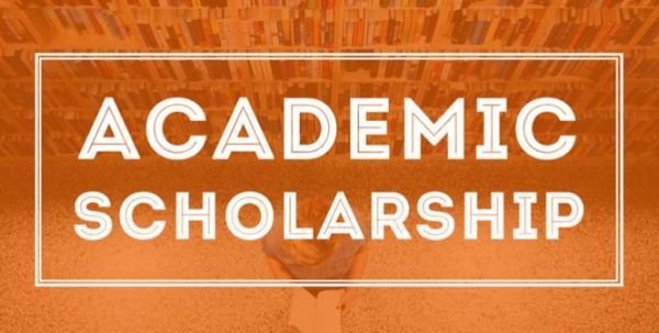 Academic Scholarship Written On A Orange Background.