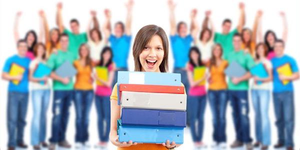 A College Girl Holding Large Files In Her Hand - Holding His Dream Of Competitive Exams Concept.