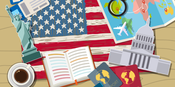 A Table Full Of USA Flag, Books & Coffee - Representing The Higher Education In The USA.