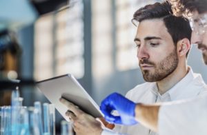 A Biotech Student Studying Some Concept For His Medical Research.