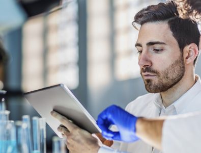 A Biotech Student Studying Some Concept For His Medical Research.