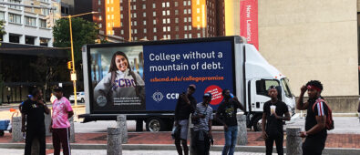 A Brightest Advertising Digital Mobile Billboard Moving Through The City About The Collge Advertisement To Attract Students For Their Higher Education.