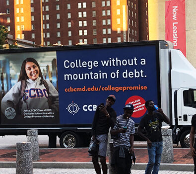A Brightest Advertising Digital Mobile Billboard Moving Through The City About The Collge Advertisement To Attract Students For Their Higher Education.